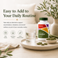 McCord Pinnacle CalmMind supplement bottle on a wooden tray with a glass of water and green capsules.