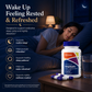 Woman sleeping in bed with McCord SleepHealth supplement bottle and capsules on nightstand.
